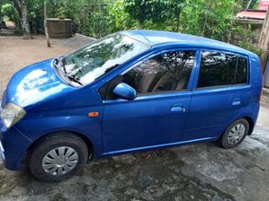 Daihatsu Mira 2004